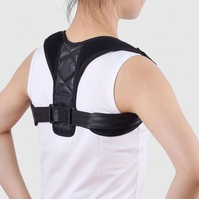 Woman wearing the posture corrector